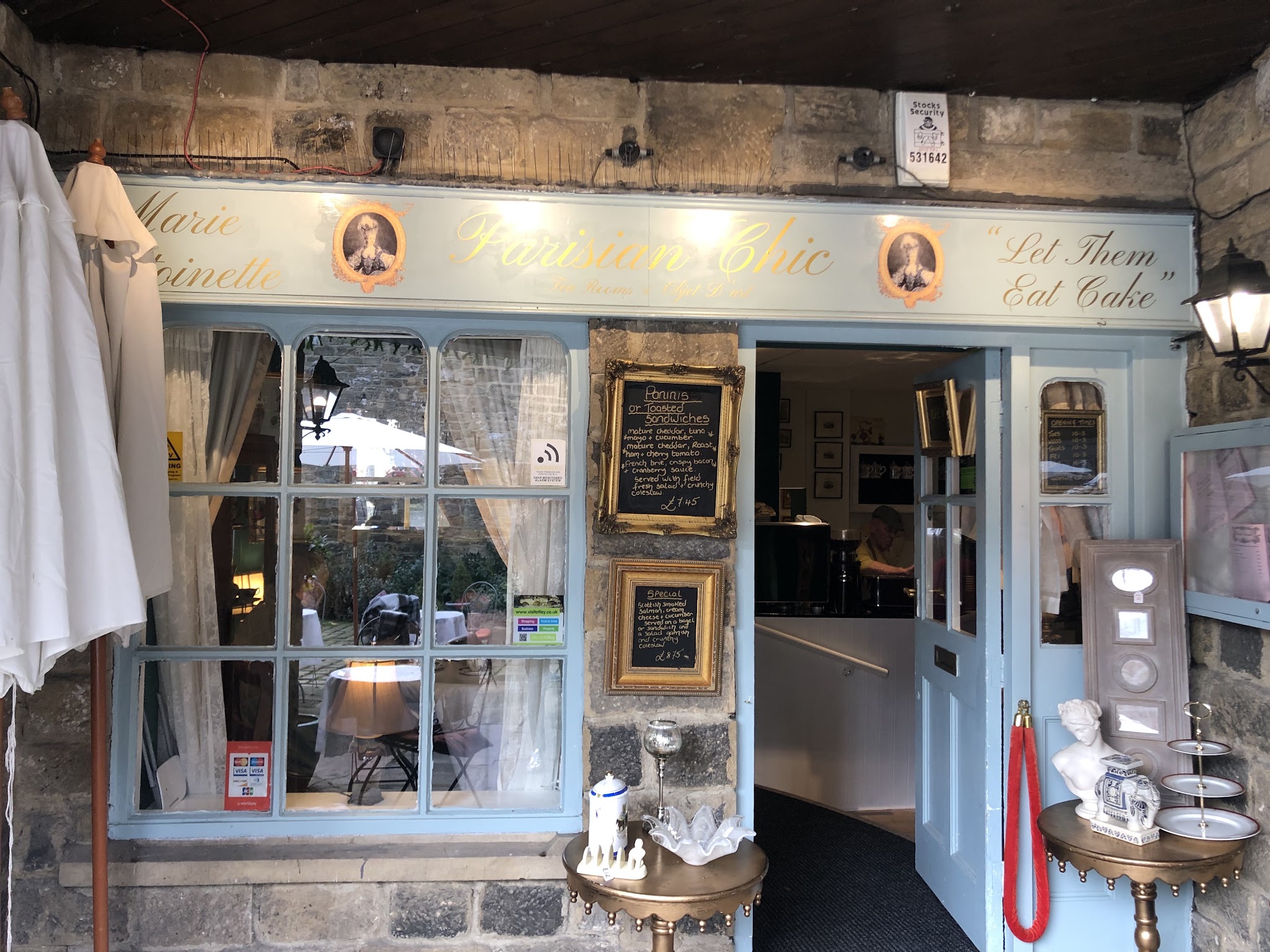 Parisian Chic's pale blue tea-room frontage in Bay Horse Court