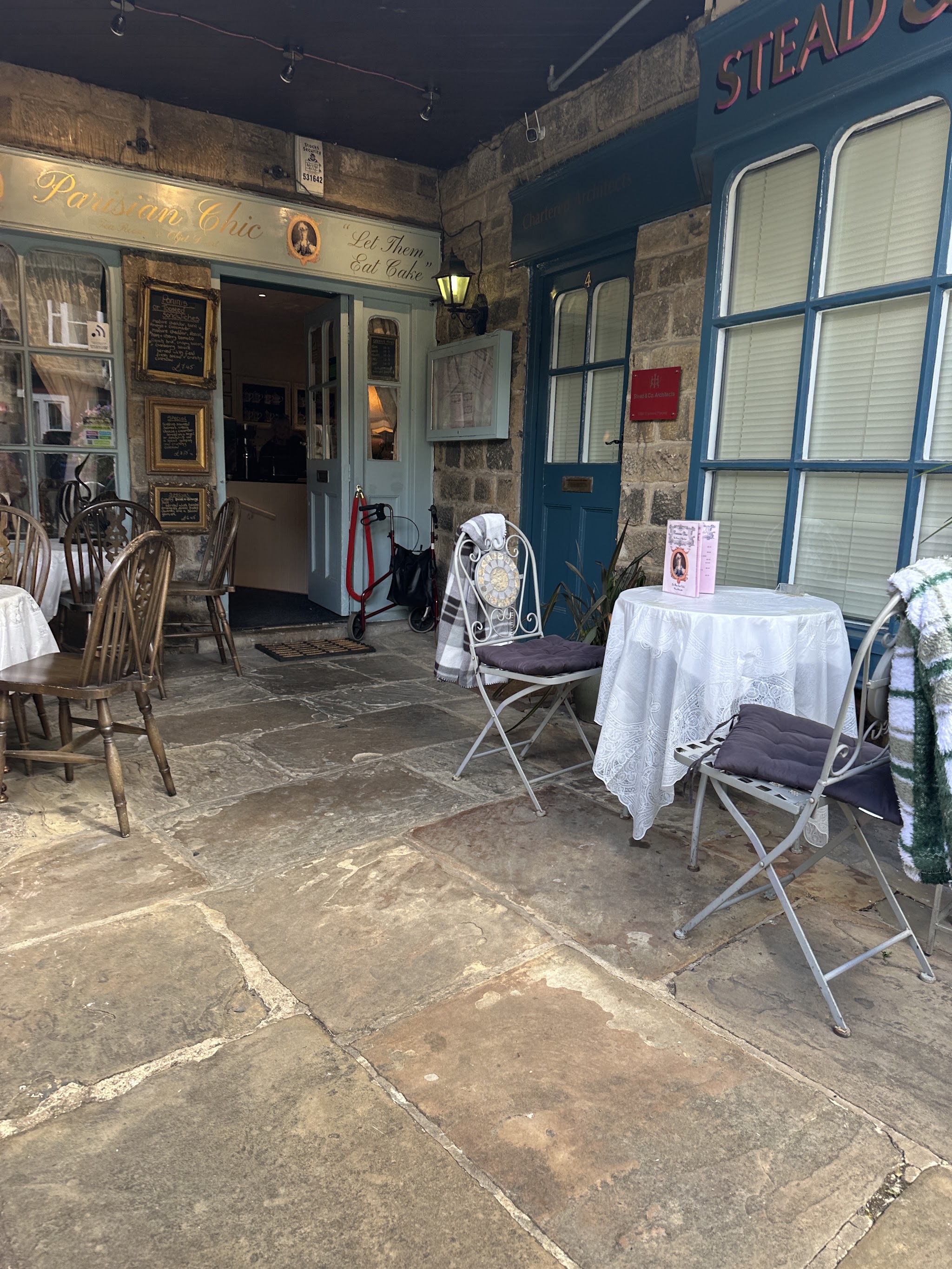 Outdoor tables beside the Parisian Chic tea-room entrance